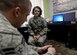 U.S. Air Force Capt. Karen Harmon, 97th Medical Operations Squadron Air Force Alcohol and Drug Abuse Prevention and Treatment program manager, and U.S. Air Force Airman 1st Class Jacob Cote, 97th MDOS mental health technician, pose for a photo, Aug 10, 2016 on Altus Air Force Base, Okla. Mental health saves Airmen’s careers by helping them with their personal issues. (U.S. Air Force Photo by Airman Jackson N Haddon/ Released)