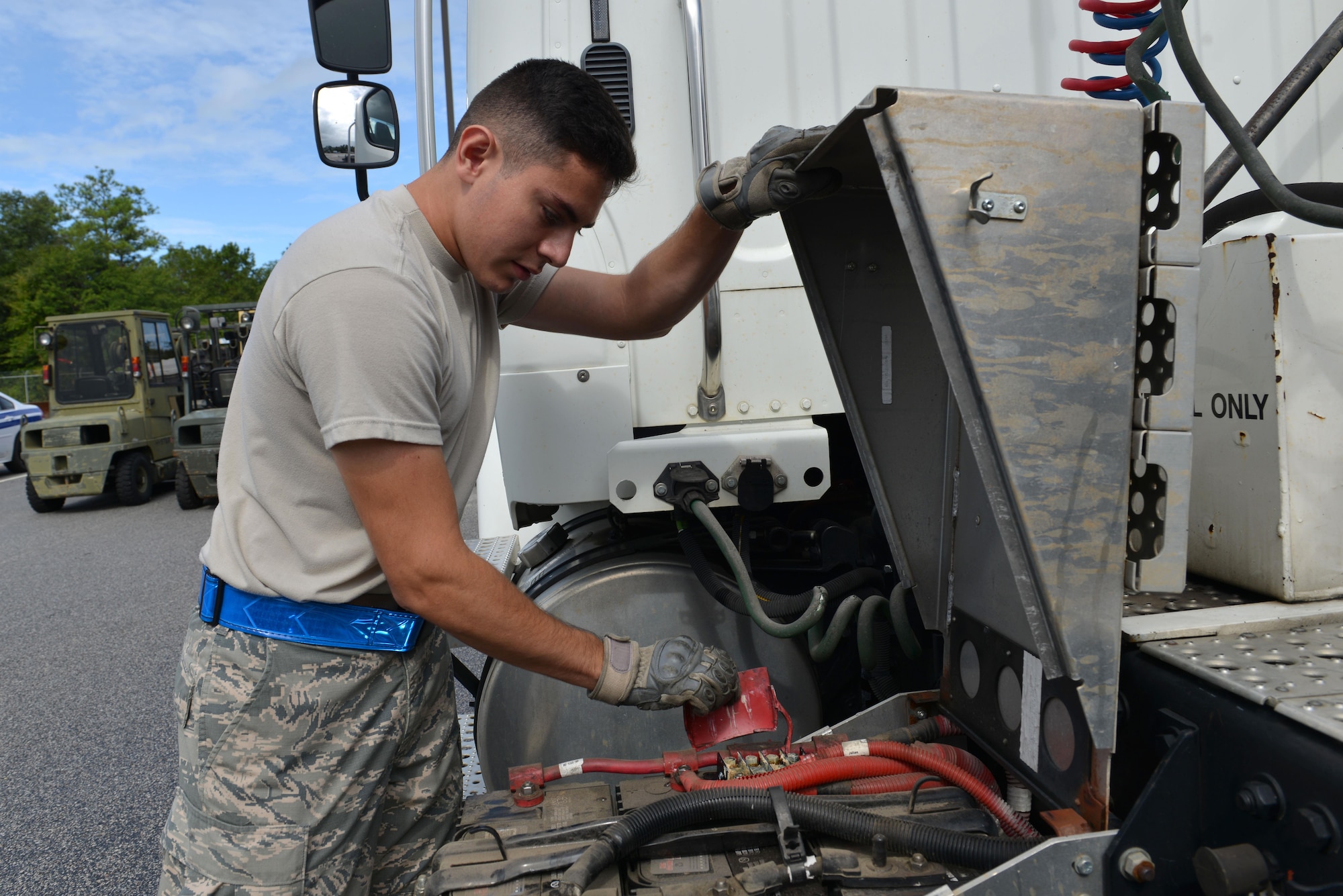 U.S. Air Force Airman Alejandro Ponce, 20th Logistics Readiness Squadron vehicle operations dispatcher, inspects a tractor trailer at Shaw Air Force Base, S.C., Aug. 10, 2016. Vehicle operations oversees 69 various vehicles and performs weekly inspections to prevent mechanical issues from developing. (U.S. Air Force photo by Airman 1st Class Destinee Sweeney)