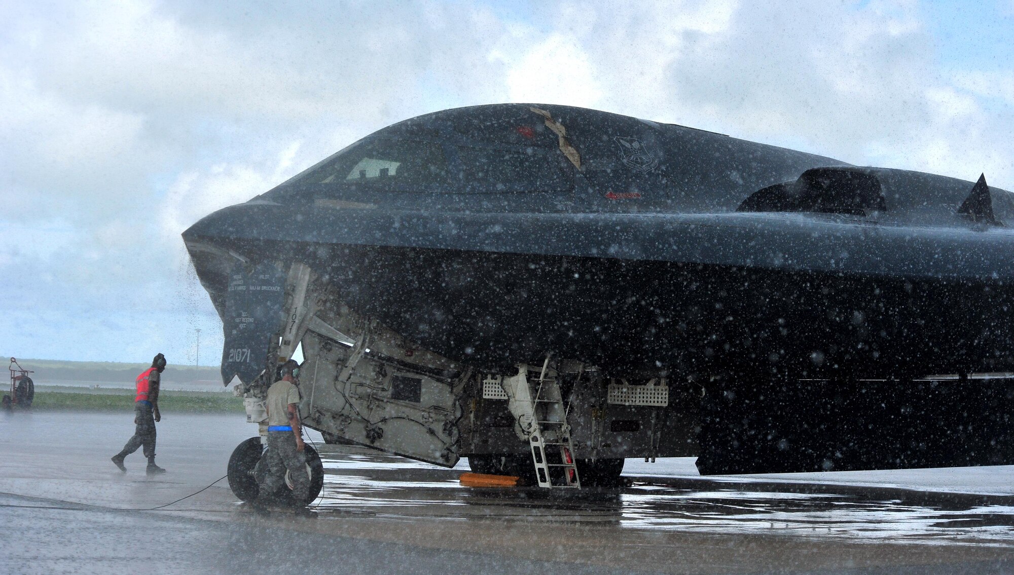U.S. Air Force Senior Airman Khari, left, and Senior Airman Alec Kinney, both crew chiefs assigned to the 509th Aircraft Maintenance Squadron, deployed from Whiteman Air Force Base, Mo., conduct pre-flight inspections at Andersen Air Force Base, Guam, Aug, 11, 2016. The U.S. Strategic Command forces operate 24-hours-a-day, seven-days-a-week detecting and deterring strategic attack against the U.S. and their allies. (U.S. Air Force photo by Senior Airman Jovan Banks)