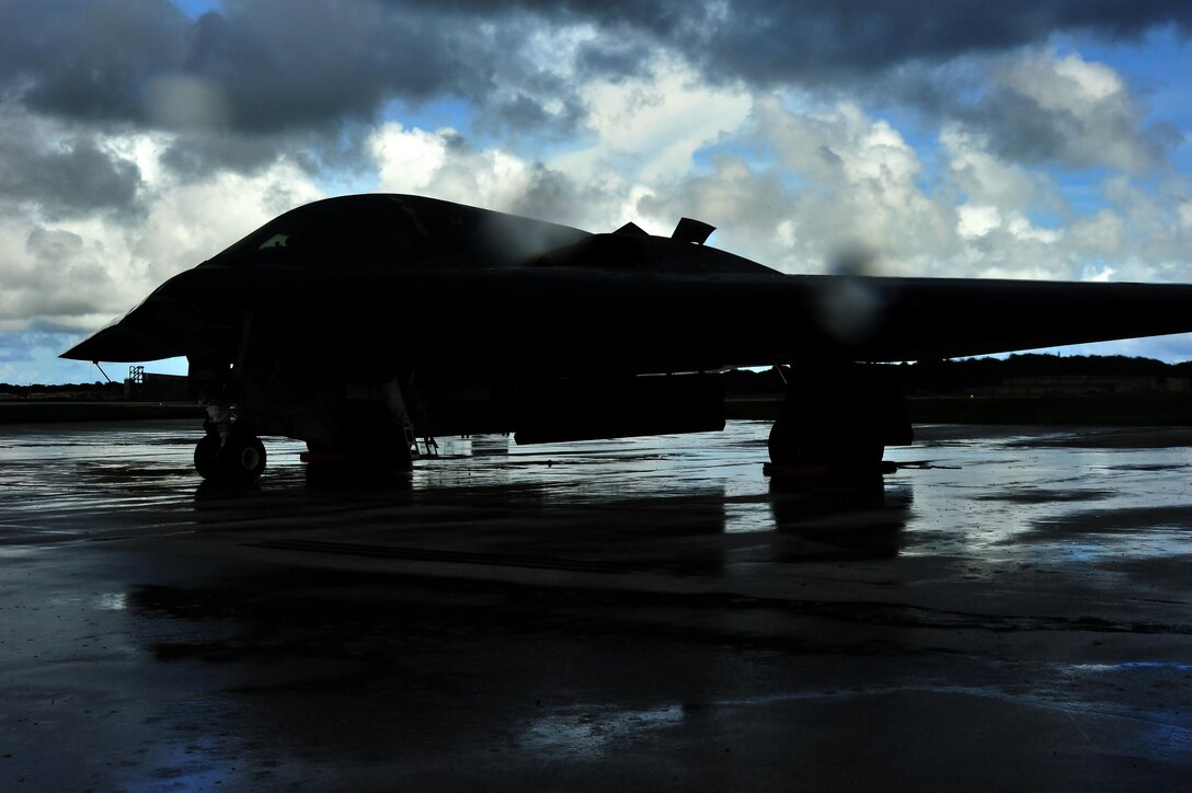 A U.S. Air Force B-2 Spirit aircraft deployed from Whiteman Air Force Base, Mo., awaits clearance to taxi onto the flightline, at Andersen Air Force Base, Guam, Aug. 11, 2016. The U.S. maintains a strong, credible bomber force that enhances the security and stability of allies and partners. (U.S. Air Force photo by Senior Airman Jovan Banks)