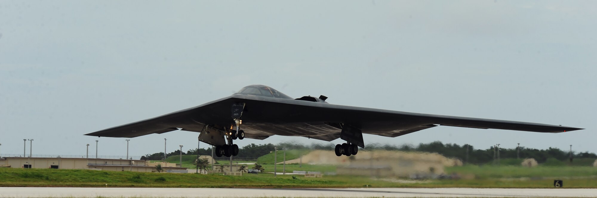 A U.S. Air Force B -2 Spirit aircraft deployed from Whiteman Air Force Base, Mo., takes flight at Andersen Air Force Base, Guam, Aug. 15, 2016. More than 200 Airmen and three B-2s deployed from Whiteman Air Force Base, Mo., in support of U.S. Pacific Command’s Bomber Assurance and Deterrence (BAAD) missions. The BAAD deployments are part of a long-standing history of maintaining a consistent bomber presence in the Indo-Asia-Pacific in order to maintain regional stability, and provide assurance to our allies and partners in the region. (U.S. Air Force photo by Senior Airman Jovan Banks)