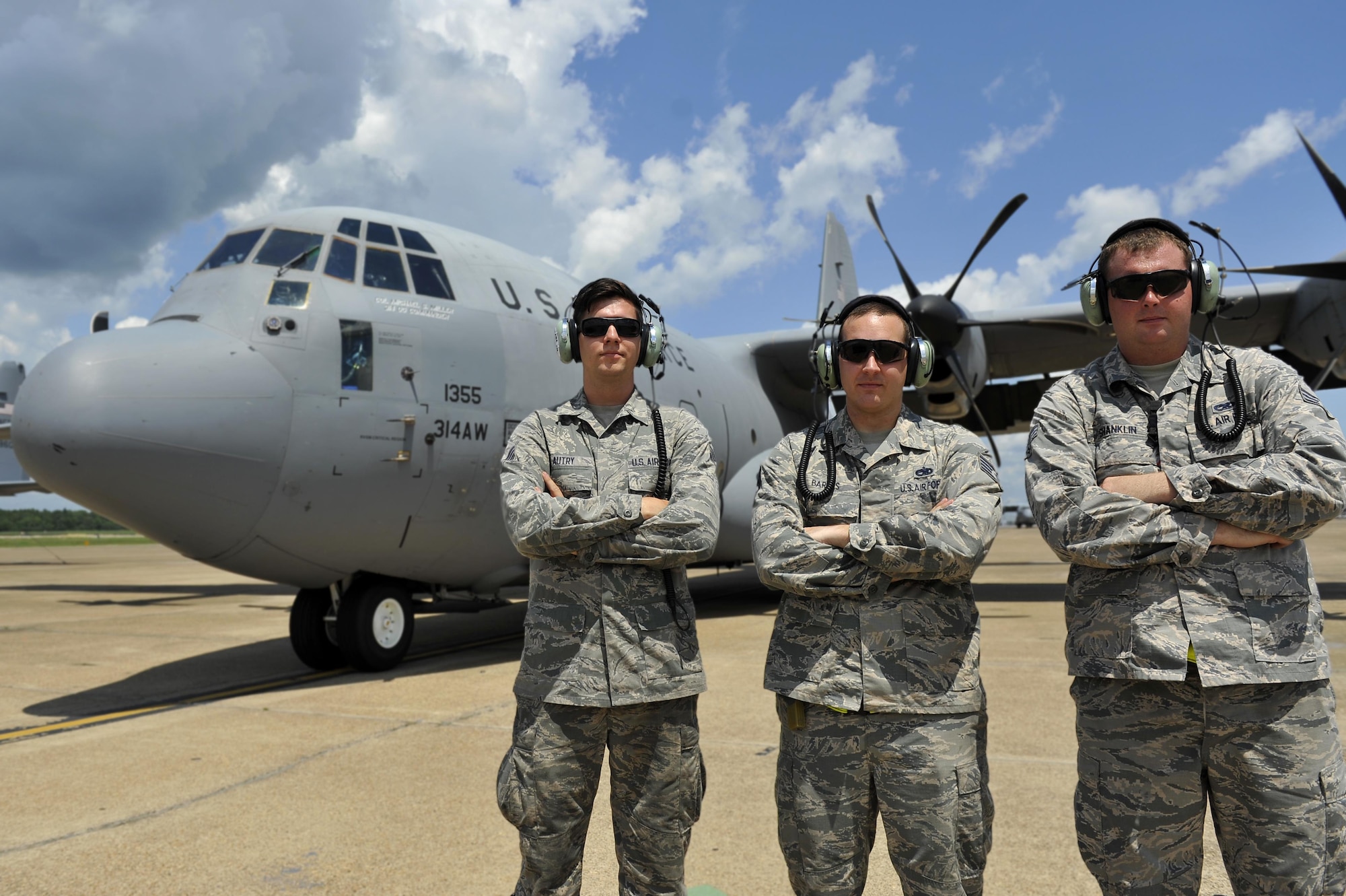 (From left) U.S. Air Force Senior Airman William Autry, U.S. Air Force Staff Sgt. Travis Barnes and U.S. Air Force Senior Airman Tyler Shanklin’s, 314th Aircraft Maintenance Squadron crew chiefs assigned to C-130J Tail No. 1335, contributions led to the Black-Letter Initial achievement Aug. 11, 2016, at Little Rock Air Force Base, Ark. A Black-Letter Initial achievement occurs when an aircraft flies with zero minor discrepancies. (U.S. Air Force photo by Kevin Sommer Giron)
