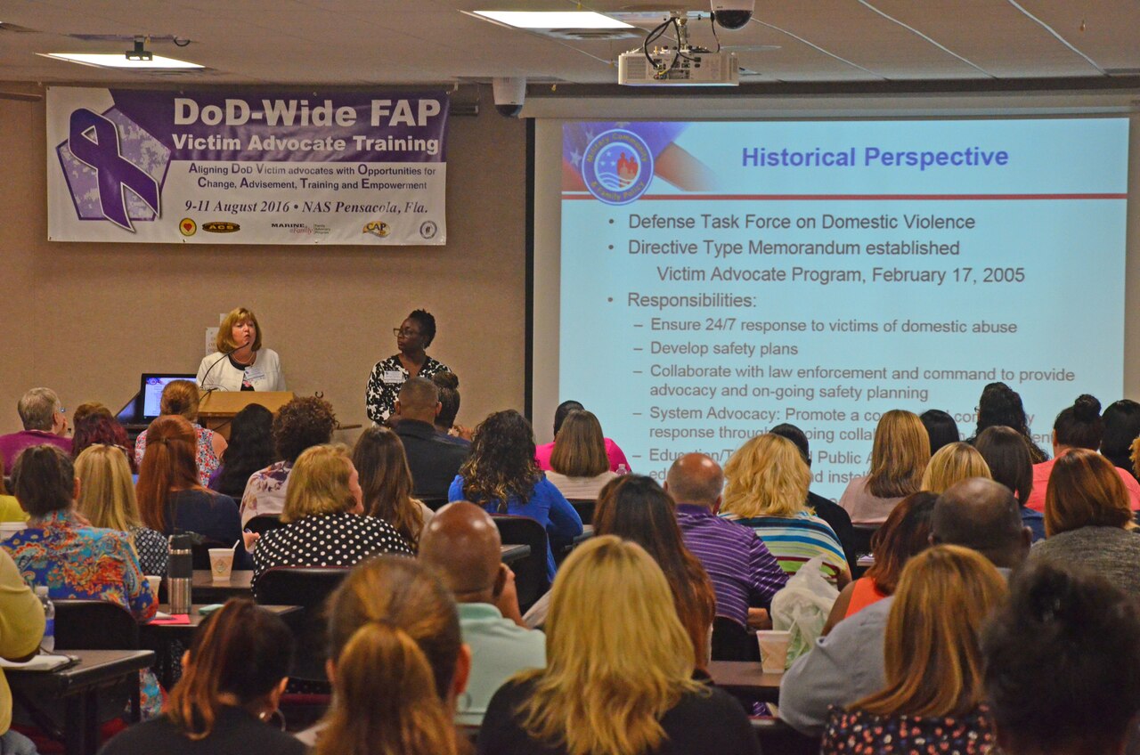 Defense Department Family Advocacy Program manager Kathy Robertson and program analyst Melvina Thornton present an update at the kickoff of the first DoD-wide Family Advocacy Program training session at Naval Air Station Pensacola, Fla., Aug. 9, 2016. DoD photo by Mike O’Connor