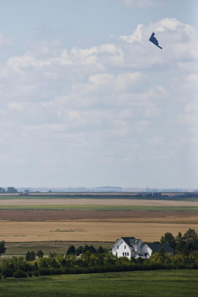 A B-2 Spirit flies through the sky during the Northern Neighbors Day Air Show at Minot Air Force Base, N.D., Aug. 13, 2016. The B-2 Spirit flew over 10,000 attendees during NND. (U.S. Air Force photo/Airman 1st Class J.T. Armstrong)