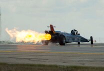 The Smoke-n-Thunder JetCar takes off during Northern Neighbors Day at Minot Air Force Base, N.D., Aug. 13, 2016. The JetCar reached close to 400 mph during the show. (U.S. Air Force photo/Senior Airman Apryl Hall)