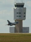 An F-16 Fighting Falcon takes off during Northern Neighbors Day at Minot Air Force Base, N.D., Aug. 13, 2016. The F-16 Viper Demo Team was a featured performance of the air show. (U.S. Air Force photo/Senior Airman Apryl Hall)