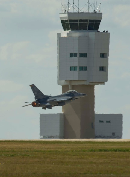 An F-16 Fighting Falcon takes off during Northern Neighbors Day at Minot Air Force Base, N.D., Aug. 13, 2016. The F-16 Viper Demo Team was a featured performance of the air show. (U.S. Air Force photo/Senior Airman Apryl Hall)