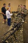 Team Minot Tactical Response Force members show visitors their gear during the Northern Neighbors Day Air Show at Minot Air Force Base, N.D., Aug. 13, 2016. During NND, the 91st Missile Wing units showcased their mission to air show attendees. (U.S. Air Force photo/Airman 1st Class J.T. Armstrong)