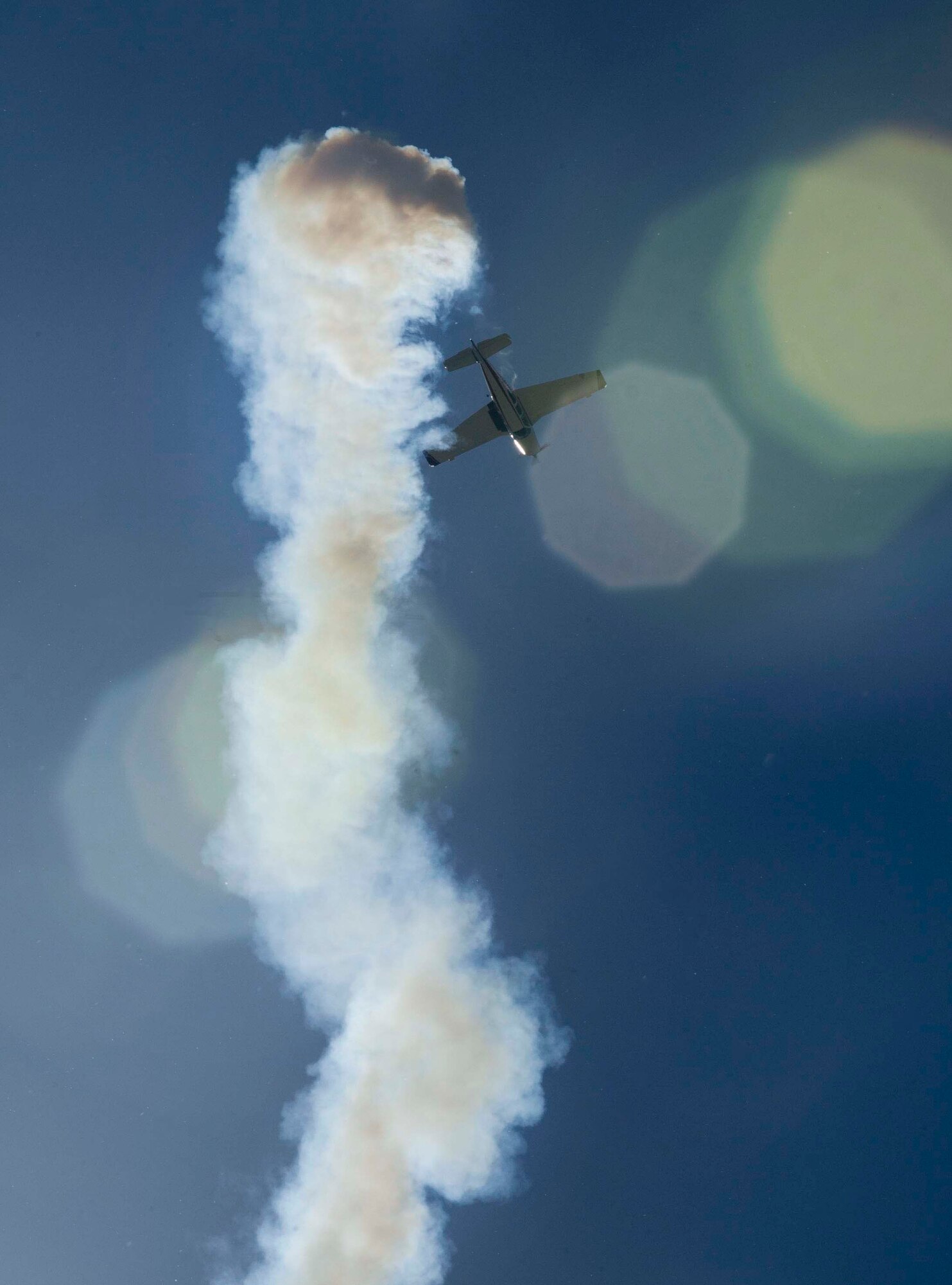 An aircraft barrels through the sky during the Northern Neighbors Day Air Show at Minot Air Force Base, N.D., Aug. 13, 2016. The air show featured demonstrations from civilian and military aircraft. (U.S. Air Force photo/Senior Airman Sahara L. Fales)