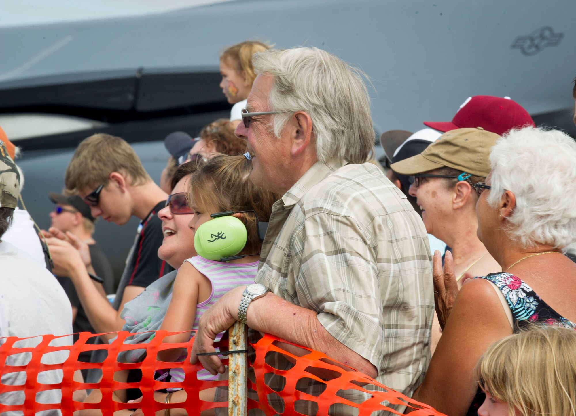 A crowd watches an aerial demonstration during the Northern Neighbors Day Air Show at Minot Air Force Base, N.D., Aug. 13, 2016. This was Team Minot’s first air show since 2009. (U.S. Air Force photo/Senior Airman Sahara L. Fales)