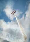 An aircraft named the “Red Baron” performs during the Northern Neighbors Day Air Show at Minot Air Force Base, N.D., Aug. 13, 2016. The pilot demonstrated aerial acrobatics during the air show. (U.S. Air Force photo/Senior Airman Sahara L. Fales)
