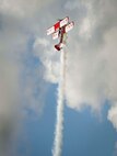 An aircraft named the “Red Baron” performs during the Northern Neighbors Day Air Show at Minot Air Force Base, N.D., Aug. 13, 2016. The pilot demonstrated aerial acrobatics during the air show. (U.S. Air Force photo/Senior Airman Sahara L. Fales)