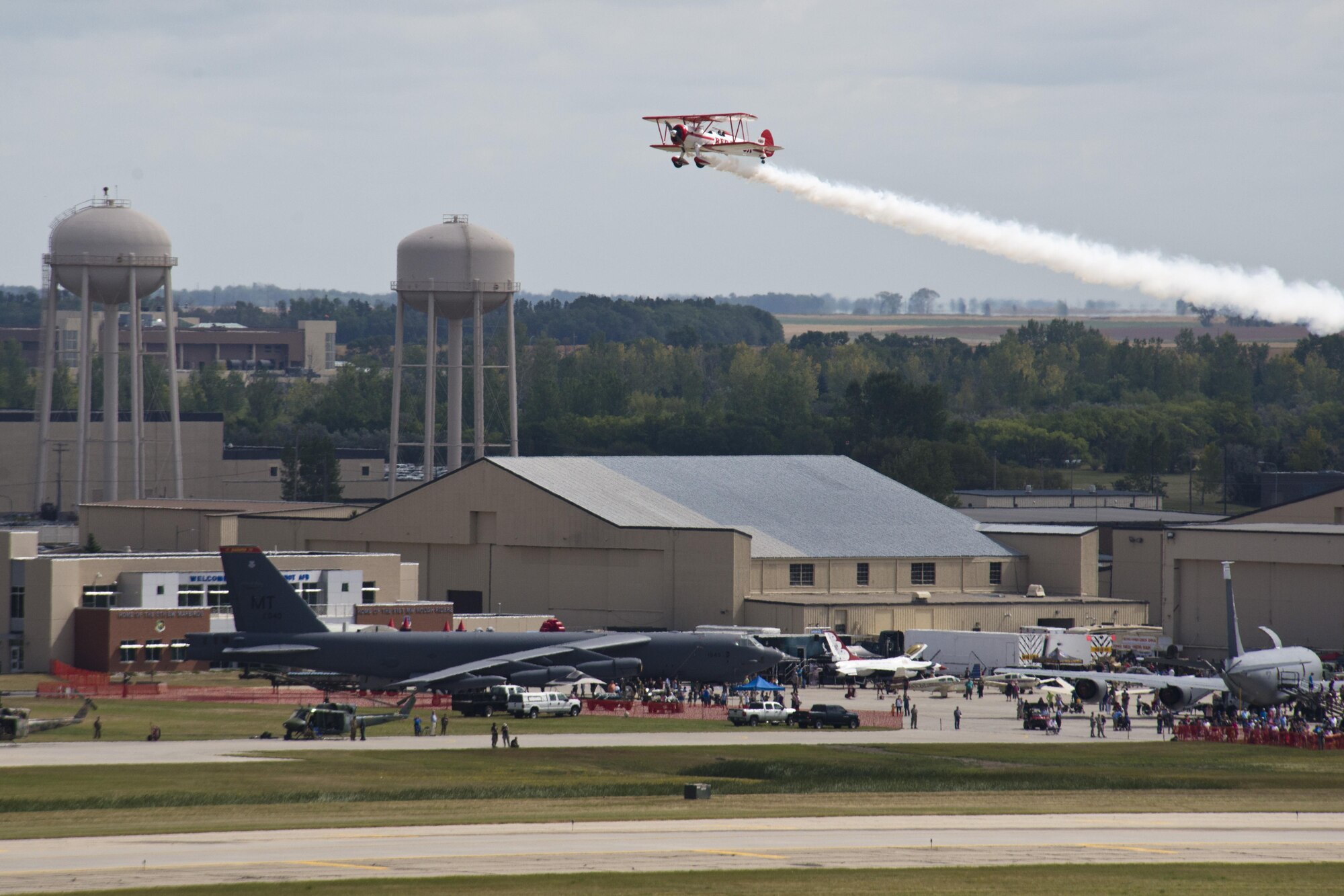 An S-2 Pitts Special flies over the crowd during the Northern Neighbors Day Air Show at Minot Air Force Base, N.D., Aug. 13, 2016. Air show attendees were able to see numerous acrobatic acts while at NND. (U.S. Air Force photo/Airman 1st Class J.T. Armstrong)
