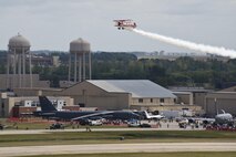 An S-2 Pitts Special flies over the crowd during the Northern Neighbors Day Air Show at Minot Air Force Base, N.D., Aug. 13, 2016. Air show attendees were able to see numerous acrobatic acts while at NND. (U.S. Air Force photo/Airman 1st Class J.T. Armstrong)
