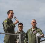 Spectators watch an F-16 Fighting Falcon demo during the Northern Neighbors Day Air Show at Minot Air Force Base, N.D., Aug. 13, 2016. NND included several aerial acts including the F-16, bi-plane crop dusters and old World War II planes. (U.S. Air Force photo/Airman 1st Class Christian Sullivan)