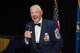 Retired U.S. Air Force Chief Master Sgt. Robert D. Gaylor, fifth Chief Master Sergeant of the Air Force, laughs while speaking at a senior NCO induction ceremony during his visit to Cannon Air Force Base, N.M., Aug. 11, 2016. Gaylor acted as the guest speaker and provided newly selected master sergeants with guidance on the next step in their career. (U.S. Air Force photo by Senior Airman Luke Kitterman/Released)