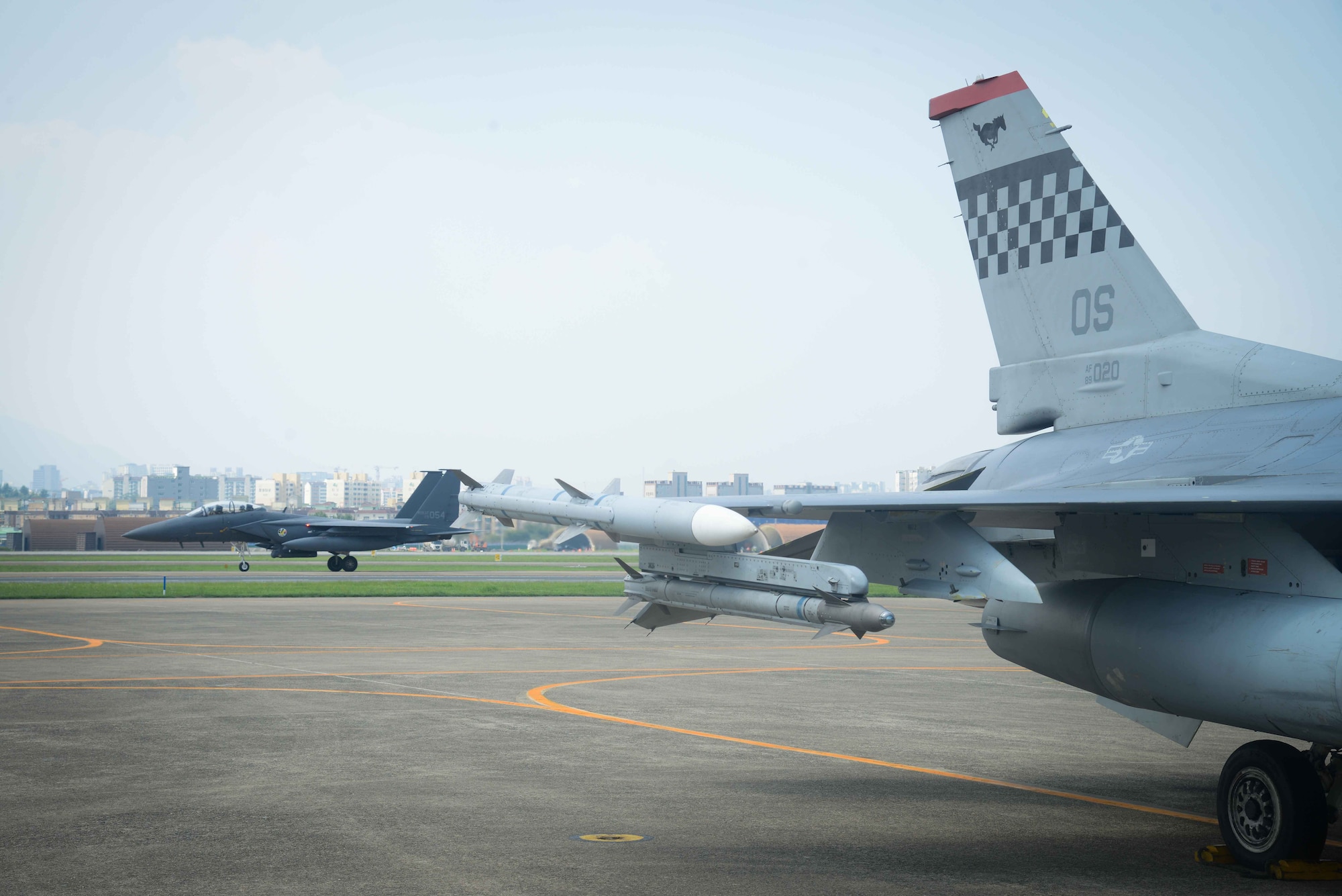 An F-15K Slam Eagle from the Republic of Korea air force’s 11th Fighter Wing taxis on the flightline before a flying training mission for Buddy Wing 16-7 at Daegu Air Base, ROK, Aug. 12, 2016. Members participating in Buddy Wing train to build relationships and broaden their knowledge of working in a joint environment with combined operations aimed at deterring enemy aggression. (U.S. Air Force photo by Senior Airman Dillian Bamman)
