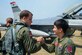 Capt. Ryan Pebler, a 36th Fighter Squadron F-16 Fighting Falcon pilot, shakes hands with South Korean air force Capt. Chon Hun Min, a 11th Fighter Wing F-15K Slam Eagle pilot, before takeoff during Buddy Wing 16-7 at Daegu Air Base, South Korea, Aug. 12, 2016. In October, both Pebler and Chon plan to participate in Red Flag-Alaska, a Pacific Air Forces exercise that provides joint offensive counter-air, interdiction, close air support and large force employment training in a simulated combat environment. (U.S. Air Force photo/Senior Airman Dillian Bamman)