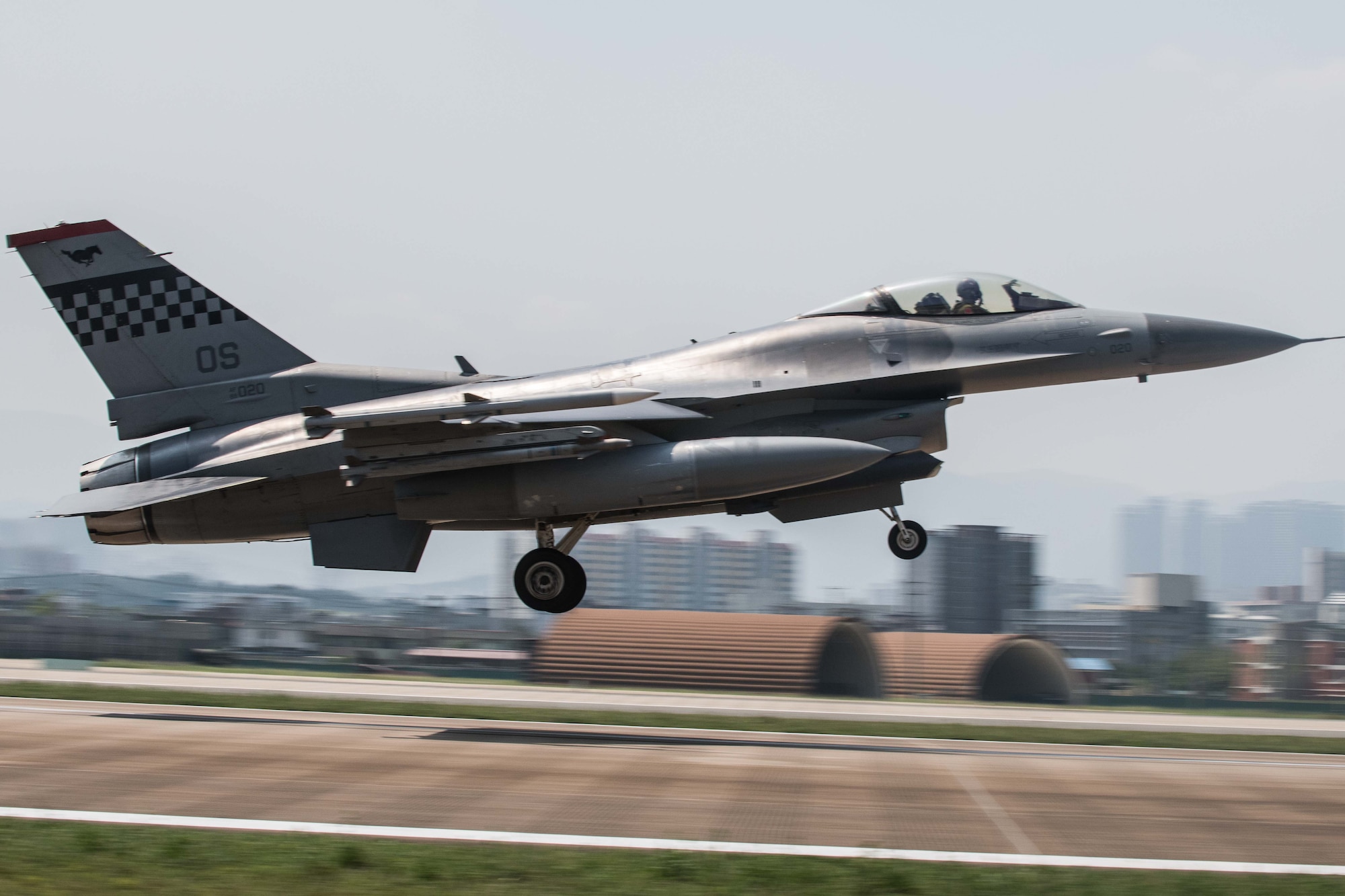 An F-16 Fighting Falcon from the 36th Fighter Squadron takes off for a flying training mission during Buddy Wing 16-7 at Daegu Air Base, Republic of Korea, Aug. 12, 2016.  Members participating in Buddy Wing train to build relationships and broaden their knowledge of working in a joint environment with combined operations aimed at deterring enemy aggression. (U.S. Air Force photo by Senior Airman Dillian Bamman)