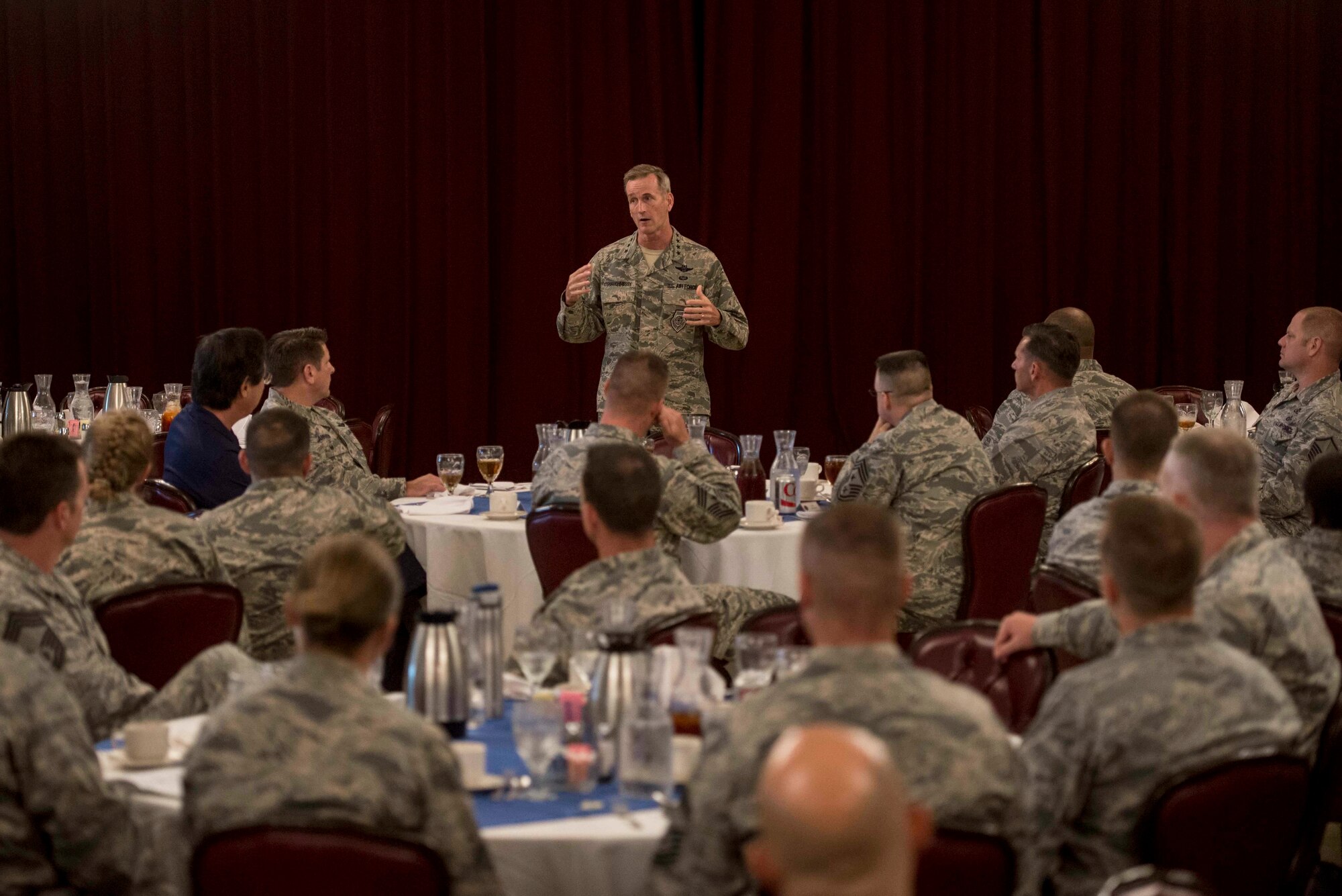 U.S. Air Force Gen. Terrence J. O’Shaughnessy, Pacific Air Forces commander, answers questions from commanders during a luncheon at Kadena Air Base, Japan, Aug. 11, 2016. During his three-day visit, the general addressed several issues that are important to him.  He also communicated expectations with Kadena leaders. (U.S. Air Force photo by Senior Airman Omari Bernard)