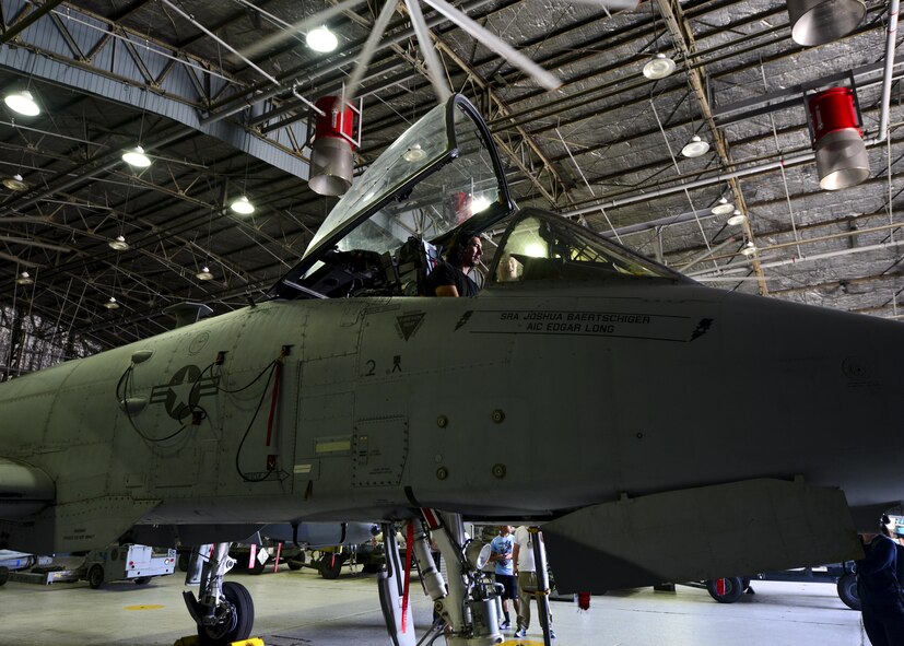 Actor Adam Driver looks over the controls of an A-10 Thunderbolt II at Osan Air Base, Republic of Korea, Aug. 13, 2016. Driver was given a first-hand look at an A-10 and an F-16 Fighting Falcon before performing in a reading of the play “Lobby Hero” on base. (U.S. Air Force photo by Senior Airman Victor J. Caputo/Released)