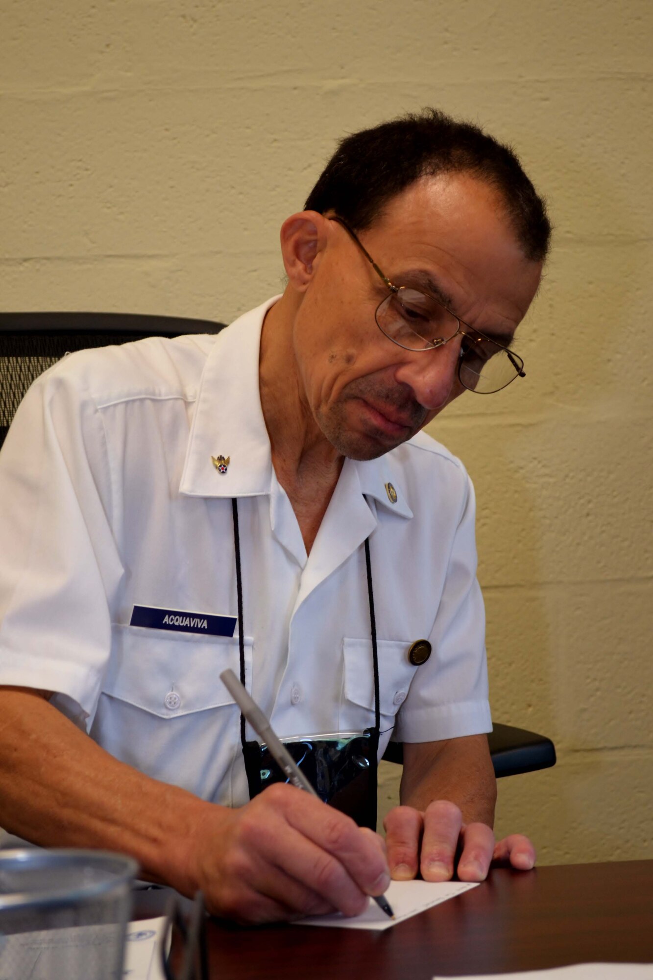 Retired Master Sgt. Vince Aquaviva, Horsham Air Guard Station Retire Activities Office (RAO) co-director, prepares a form at the installation RAO, Horsham Air Guard Station, Pa., Aug.  13, 2016. Aquaviva was recognized as the RAO Volunteer of the Year during an informal presentation ceremony that took place during August’s unit training assembly. (U.S. Air National Guard photo by Tech. Sgt. Andria Allmond)