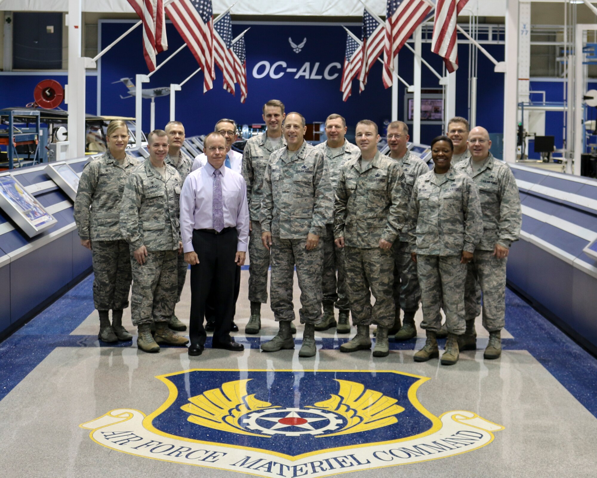 Lt. Gen. Lee K. Levy II, center, Air Force Sustainment Center Commander, is surrounded by commanders and senior leaders from across the Center brought together for a Commanders Conference Aug. 3-4 at Tinker Air Force Base, Okla. General Levy discussed and took inputs from the commanders on the AFSC Strategic Plan in a value-added environment where he said, “All the new commanders and leaders on the AFSC staff got to know each other and build a professional relationship that will pay dividends as they work together to support the mission and people of the AFSC.” Pictured are, front row from left, Col. David Sanford, commander, 635th Supply Chain Operations Wing, Scott AFB, Ill.; Mr. Jeff Allen, AFSC executive director; General Levy; Chief Master Sgt. Gary Sharp, AFSC command chief master sergeant; and Col. Stephanie Wilson, commander, 72nd Air Base Wing. Back row, from left, Col. Jennifer Hammerstedt, commander, 75th Air Base Wing, Hill AFB, Utah; Brig. Gen. Walter Lindsley, former commander, Warner Robins Air Logistics Complex; Mr. Frank Washburn, director, 448th Supply Chain Management Wing; Brig. Gen. Tom Miller, AFSC vice commander; Brig. Gen. Mark Johnson, commander, Oklahoma City Air Logistics Complex; Col. John Kubinec, WR-ALC commander; Brig. Gen. Steve Bleymaier, commander, Ogden Air Logistics Complex; and Col. Jeffrey King, commander, 78th Air Base Wing, Robins AFB, Ga. (U.S. Air Force photo/Abraham Martinez)