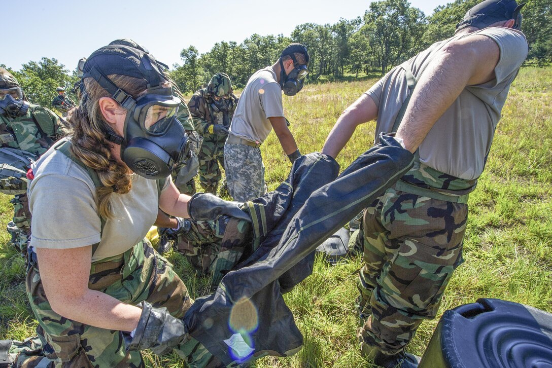 Air Force and Army emergency management personnel participate in chemical, biological, radiological, nuclear and explosive training during exercise Patriot Warrior 2016 at Fort McCoy, Wis., Aug.14, 2016. The training ranges from bare base buildup to full operational capabilities. Air Force photo by Airman 1st Class Christopher Dyer