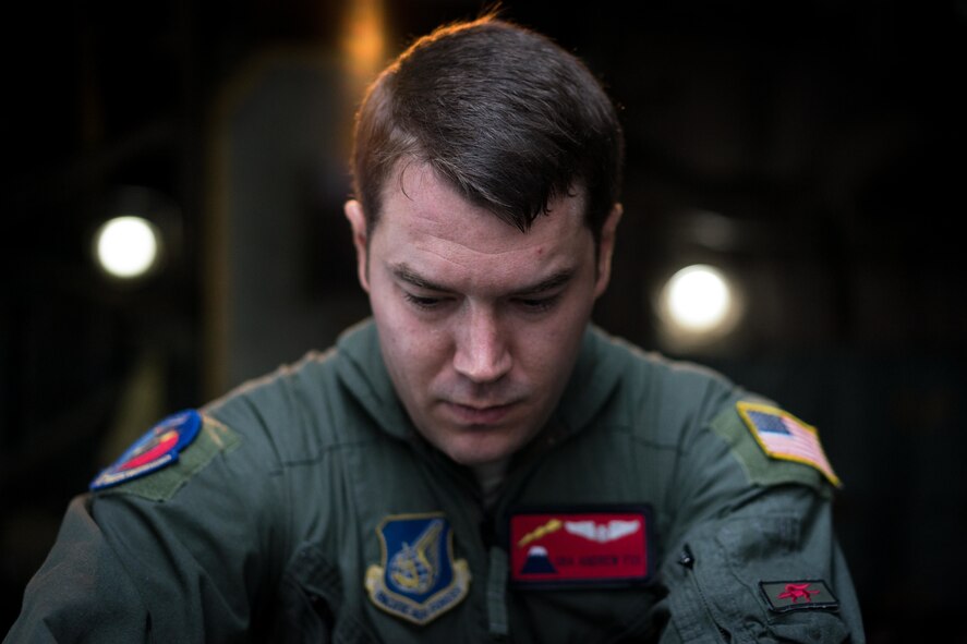 U.S. Air Force Senior Airman Andrew Fox, 36th Airlift Squadron joint airdrop inspector, inspects a strap during Red Flag Alaska on Joint Base Elmendorf-Richardson, Alaska, Aug. 08, 2016. JAI's must perform two inspections; one before loading to ensure cargo is aircraft ready and rigged in accordance with proper rigging procedures and an after inspection of the cargo once it's been completely loaded on the aircraft. (U.S. Air Force photo by Staff Sgt. Michael Smith/Released)