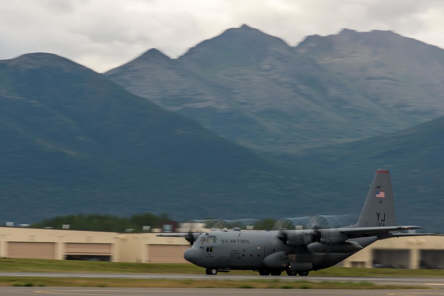 A Yokota Air Base C-130 Hercules takes off at Joint Base Elmendorf-Richardson, Alaska during Red Flag Alaska on, Aug. 11, 2016. Red Flag-Alaska is an exercise that provides joint offensive counter-air, interdiction, close air support and large force employment training in a simulated combat environment. (U.S. Air Force photo by Staff Sgt. Michael Smith/Released)