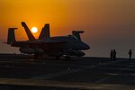 A Navy F/A-18E Super Hornet assigned to Strike Fighter Squadron 105 taxies across the flight deck of the aircraft carrier USS Dwight D. Eisenhower in the Persian Gulf, July 31, 2016. Navy photo by Petty Officer 3rd Class Nathan Beard 