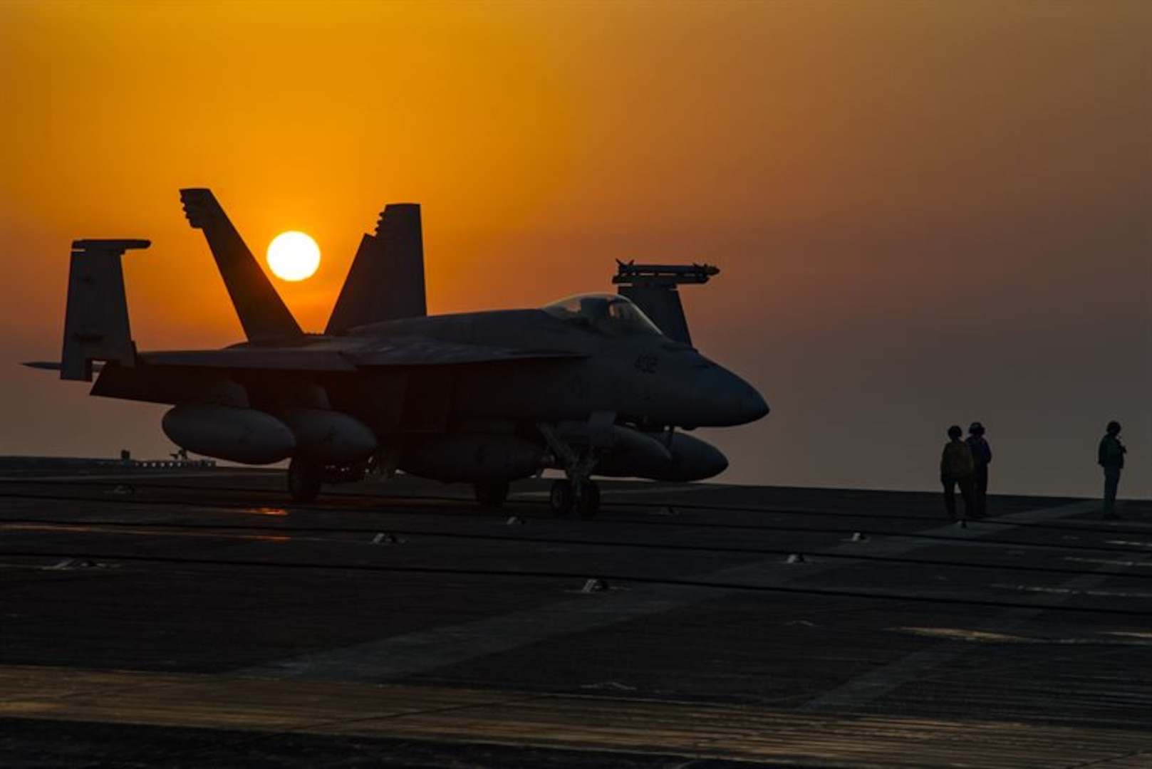 A Navy F/A-18E Super Hornet assigned to Strike Fighter Squadron 105 taxies across the flight deck of the aircraft carrier USS Dwight D. Eisenhower in the Persian Gulf, July 31, 2016. Navy photo by Petty Officer 3rd Class Nathan Beard 