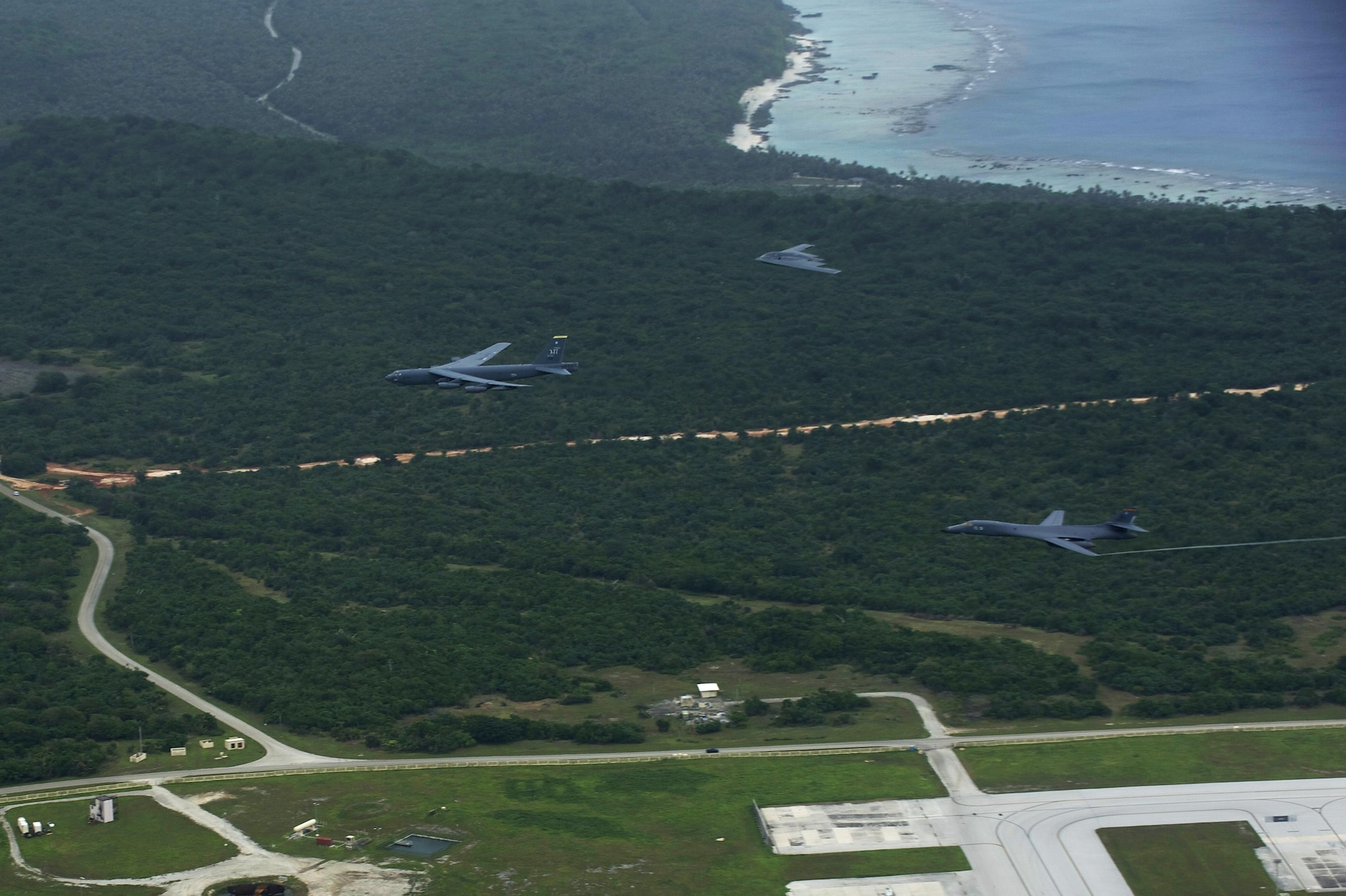 A U.S. Air Force B-52 Stratofortress, B-1 Lancer and B-2 Spirit launch from Andersen Air Force Base, Guam, for an integrated bomber operation Aug.17, 2016. This mission marks the first time in history that all three of Air Force Global Strike Command's strategic bomber aircraft are simultaneously conducting integrated operations in the U.S. Pacific Command area of operations. As of Aug. 15, the B-1 Lancer will be temporarily deployed to Guam in support of U.S. Pacific Command's Continuous Bomber Presence mission. (U.S. Air Force photo by Staff Sgt. Sandra Welch)