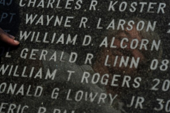 Bonnie Alcorn, sister of fallen U.S. Air Force Capt. William Alcorn, finds her brother’s name among the Airmen who have given the ultimate sacrifice while assigned at Spangdahlem Air Base, Germany, Aug. 15, 2016. Capt. Alcorn passed away on Mar. 23, 1981 during a training sortie in Germany. (U.S. Air Force photo by Staff Sgt. Jonathan Snyder)