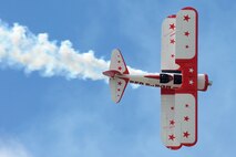 The Red Baron plane performed aerial stunts at the Northern Neighbors Day Air Show at Minot Air Force Base, N.D., Aug. 13, 2016.  The Red Baron is a WWII era Stearman bi-plane that was part of the Red Baron Squadron. (U.S. Air Force photo/Senior Airman Kristoffer Kaubisch)