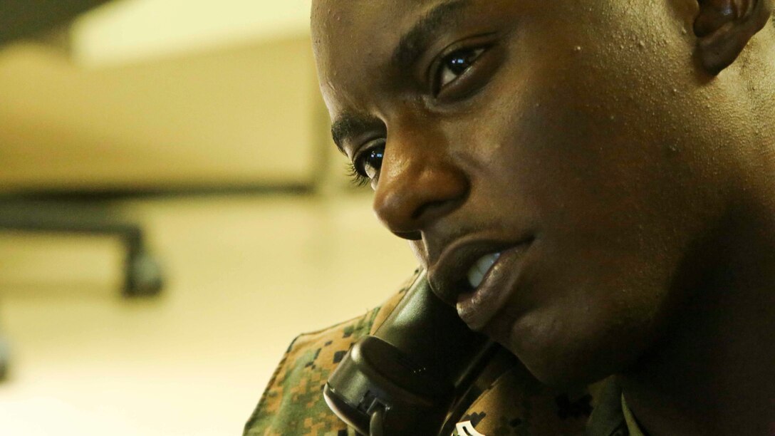 Marine Corps Cpl. Imani Golden, an embarkation specialist with III Marine Expeditionary Force Headquarters Group, arranges deployment flights in Okinawa, Japan, Aug. 3, 2016. Embarkation specialists handle all logistics coordination when Marines travel to different countries. The forward nature of III MEF is crucial to readiness in the Pacific region. Golden is from Brooklyn, N.Y. Marine Corps photo by Lance Cpl. Nathaniel Cray