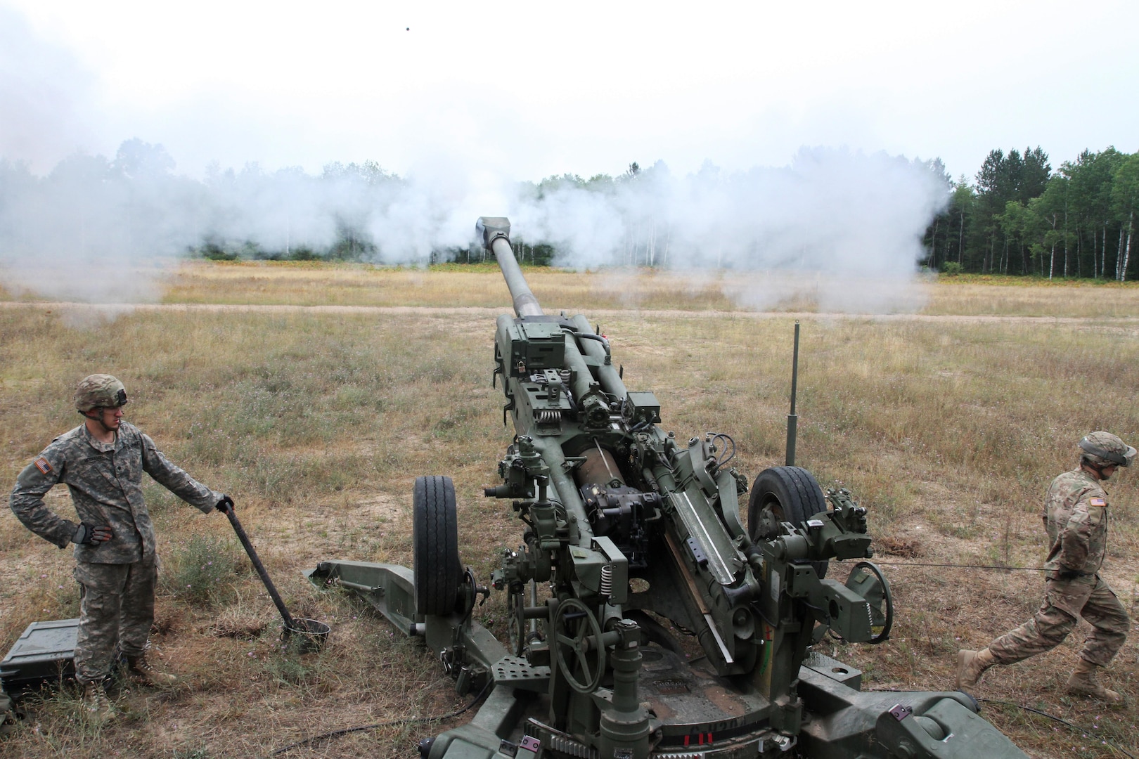 Soldiers from the 1st Battalion, 119th Field Artillery Charlie Battery out of Albion, Michigan, take part Exercise Northern Strike at the Camp Grayling Joint Maneuver Training Center. The Soldiers are responding to a call for fire by firing the M 777 "Howitzer" 155 mm Aug. 12 2016.