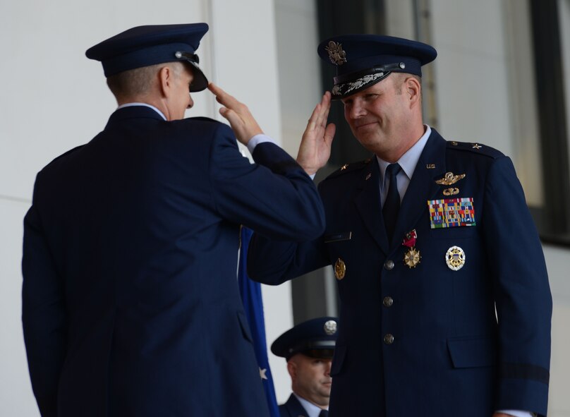 Brig. Gen. Jon T. Thomas, right, salutes Lt. Gen. Timothy M. Ray, 3rd Air Force commander after being awarded the Legion of Merit medal in recognition of his service as the 86th Airlift Wing commander, Aug. 17, 2016, Ramstein Air Base, Germany. Thomas is slated to become the Director, Strategic Plans, Requirements and Programs, Headquarters Air Mobility Command, Scott Air Force Base, Illinois. (U.S. Air Force photo/ Airman 1st Class Joshua Magbanua)