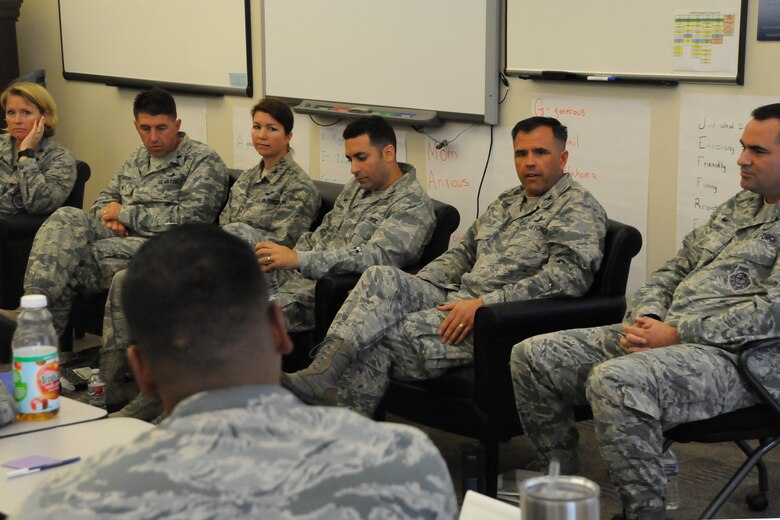 Members of base leadership listen to an noncommissioned officer’s question during the Senior NCO Professional Enhancement Course at Schriever Air Force Base, Colorado, Tuesday, Aug. 9, 2016. Burt and other commanders discussed the importance of effective leadership on a senior level. (U.S. Air Force photo/Airman William Tracy)