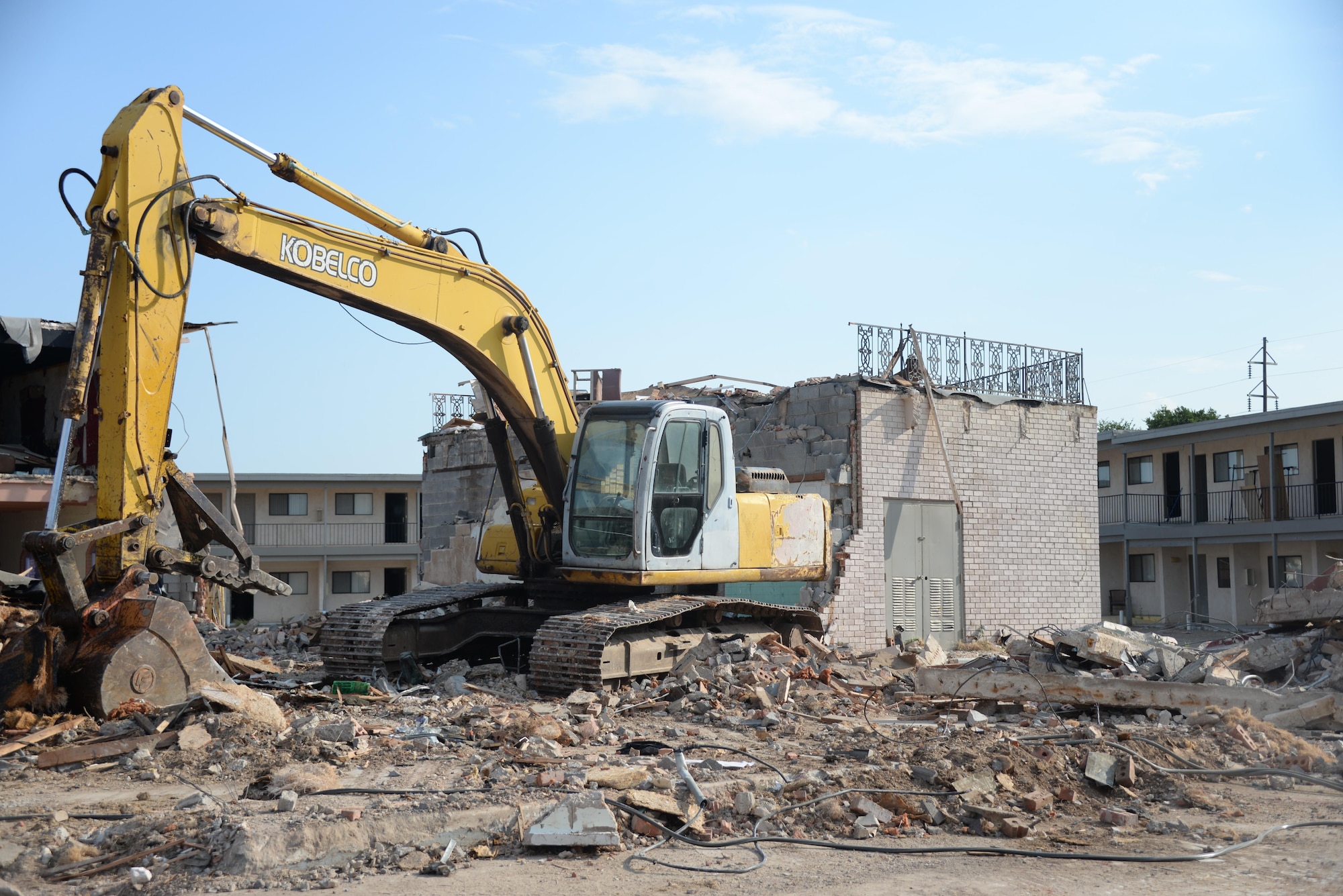 Demolition continues outside Sheppard's Main Gate as part of a $3.5 million project by the city of Wichita Falls to improve the area.