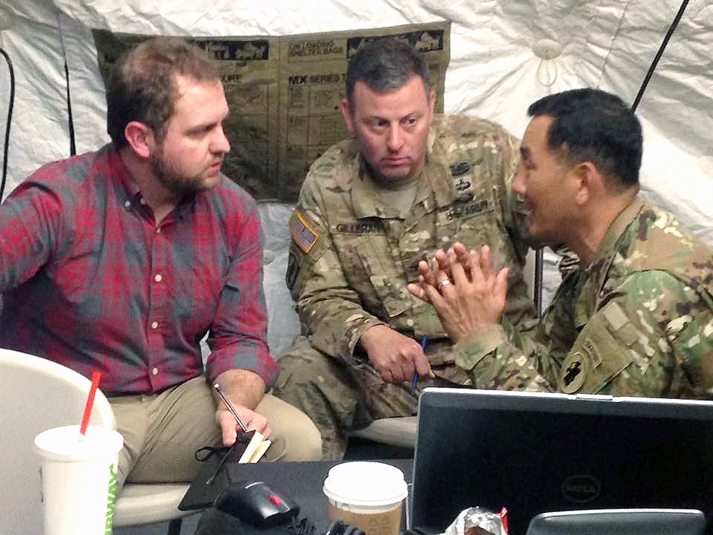 Maj. Gen. K.K. Chinn (right), U.S. Army South commanding general, speaks to Alex Horton (left), a Stars & Stripes reporter, as Col. Thomas Gilleran (center), the Army South public affairs officer, listens Aug. 3 at Fort Sam Houston. The interview was part of a media day for the Multi-National Forces-South component of the annual PANAMAX exercise.