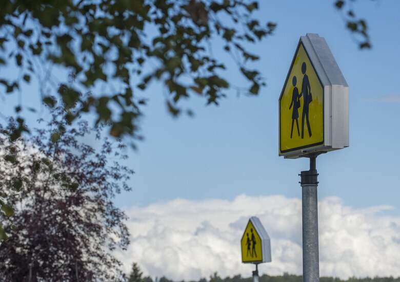 Back to school will be in full swing in less than two weeks. Joint Base Elmendorf-Richardson personnel should be mindful of the pedestrians and school zone safety lights. Drivers caught speeding by 5 mph or more in a school zone on JBER receive a mandatory 30-day driving suspension on the installation, even for a first offense. (U.S. Air Force photo by Staff Sgt. Sheila deVera) 