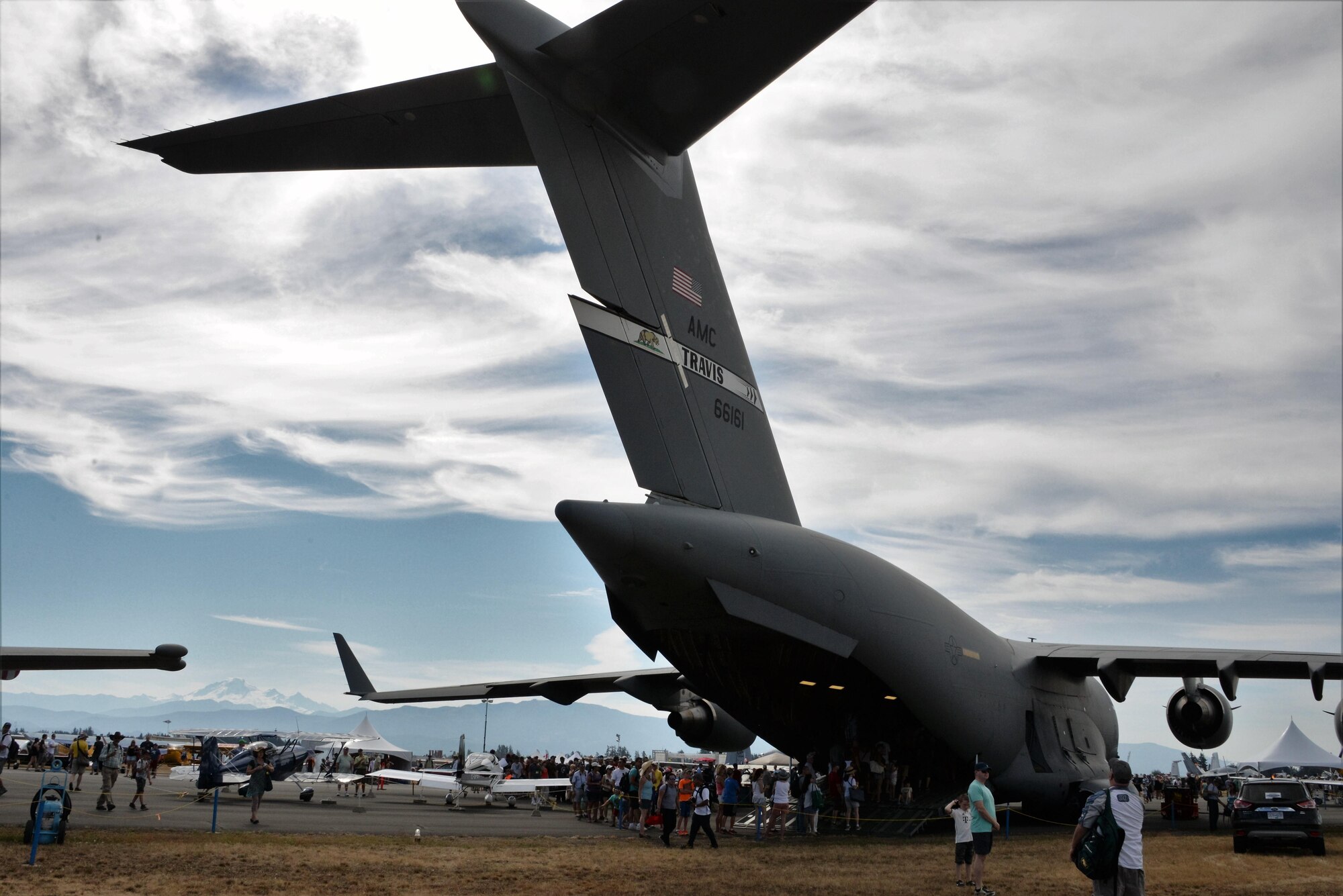 An aircrew from the 21st Airlift Squadron flew to Abbotsford, British Columbia, to participate in the Abbotsford International Airshow, Aug. 12-14, 2016. Visitors were invited to tour the cargo bay of the C-17 Globemaster III, as well as sit in the cockpit and learn about various flight controls. (U.S. Air Force photo by 2nd Lt. Geneva Croxton)