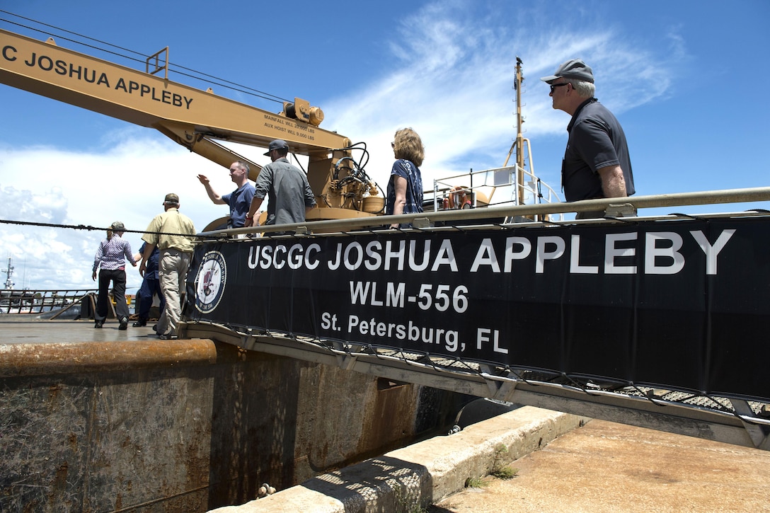 Participants of the Joint Civilian Orientation Conference board Coast Guard Cutter Joshua Appleby at Coast Guard Sector St. Petersburg, Fla., Aug. 16, 2016. DoD photo by Marine Sgt. Drew Tech