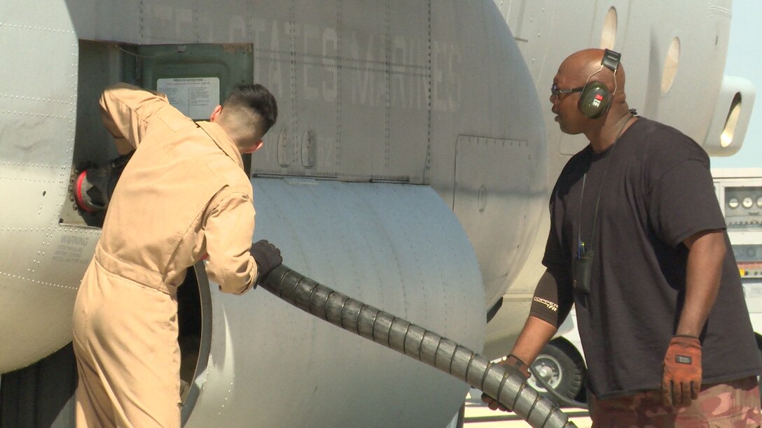 William Daniels, 502nd Logistics Readiness Squadron’s Fuels Management Flight fuels distribution worker, ensures the fuel hose of his R-11 refueler is properly connected to a Marine Corps C-130 parked on JBSA-Lackland’s flight line Sept. 30, 2015. On a typical day he can pump 50,000 to 100,000 gallons of fuel.  