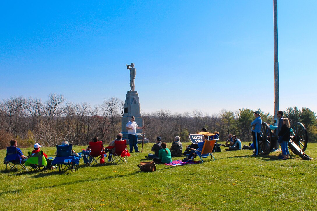 DIA analyst Greg Elder gives an intelligence and strategy briefing to staff ride participants at Barlow's Knoll on Gettysburg National Battlefield.