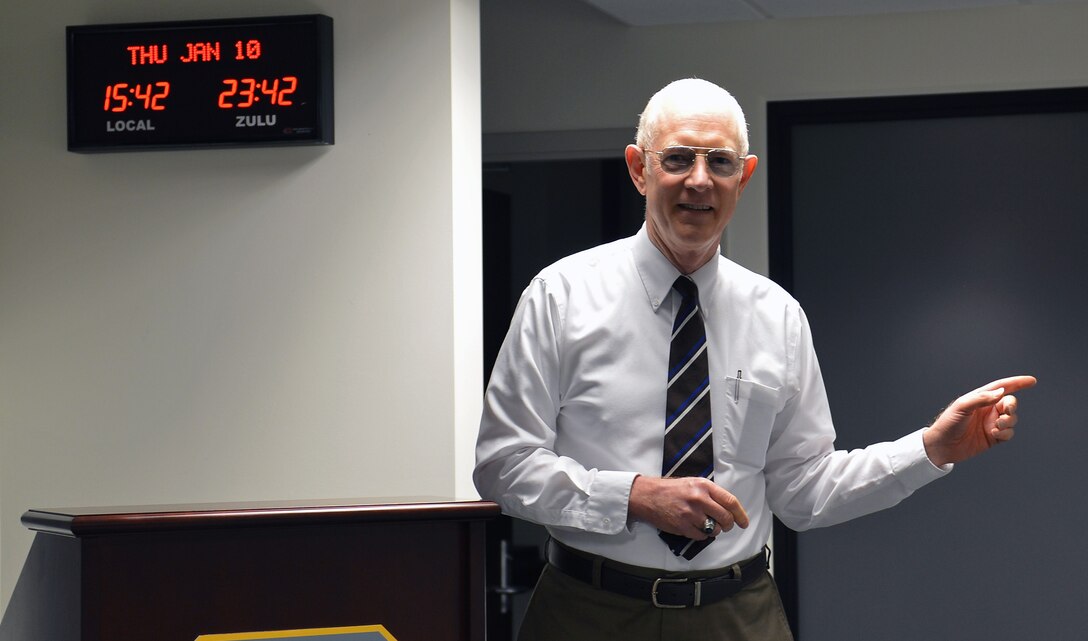 Dr. Robert Allen, 62nd Airlift Wing historian, briefs leadership on McChord history January 10, 2013, at Joint Base Lewis-McChord, Wash. Allen is responsible for managing all historical data relative to Team McChord and McChord Field’s history. (Courtesy photo) 