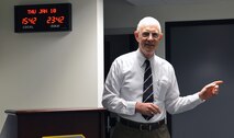 Dr. Robert Allen, 62nd Airlift Wing historian, briefs leadership on McChord history January 10, 2013, at Joint Base Lewis-McChord, Wash. Allen is responsible for managing all historical data relative to Team McChord and McChord Field’s history. (Courtesy photo) 