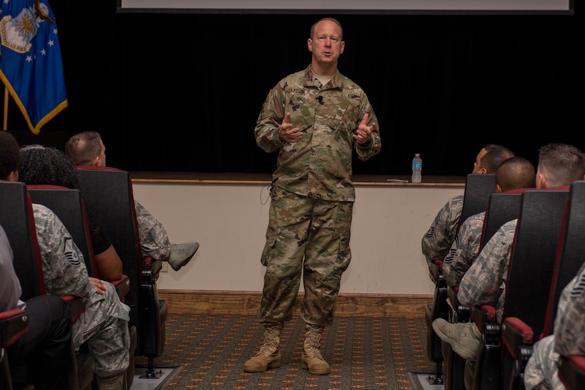 U.S. Army Col. Ralph Clayton III, 733rd Mission Support Group commander, addresses 733rd MSG personnel during a town hall at Fort Eustis, Va., Aug. 9, 2016. Clayton took this opportunity to introduce himself and meet Air Force, Army and civilian personnel who work in the 733rd MSG. (U.S. Air Force photo by Airman 1st Class Derek Seifert)