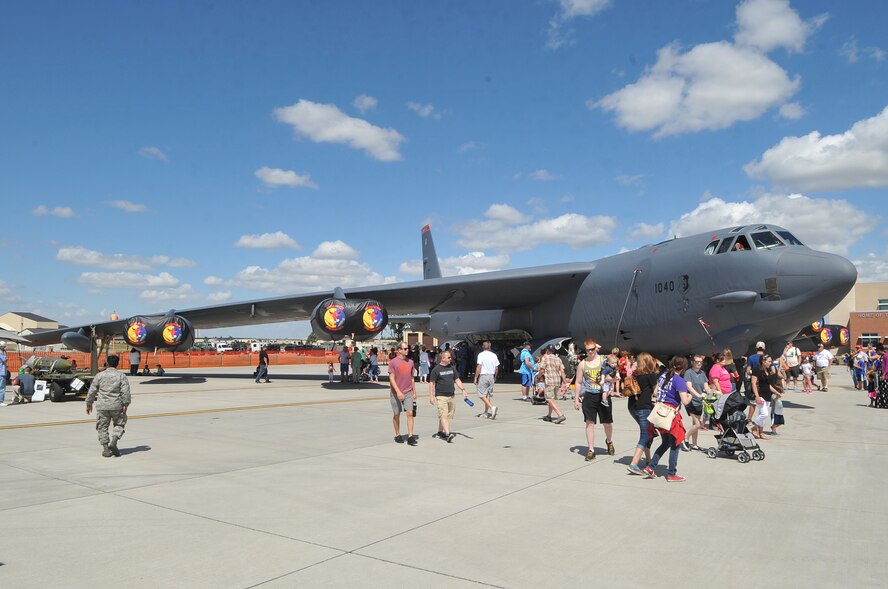 Spectators gather around the display of a B-52H Stratofortress during the Northern Neighbors Day Air Show at Minot Air Force Base, N.D., Aug. 13, 2016. The B-52 weighs approximately 185,000 lbs. and has a range of 8,800 miles. (U.S. Air Force photo/Airman 1st Class Jonathan McElderry)